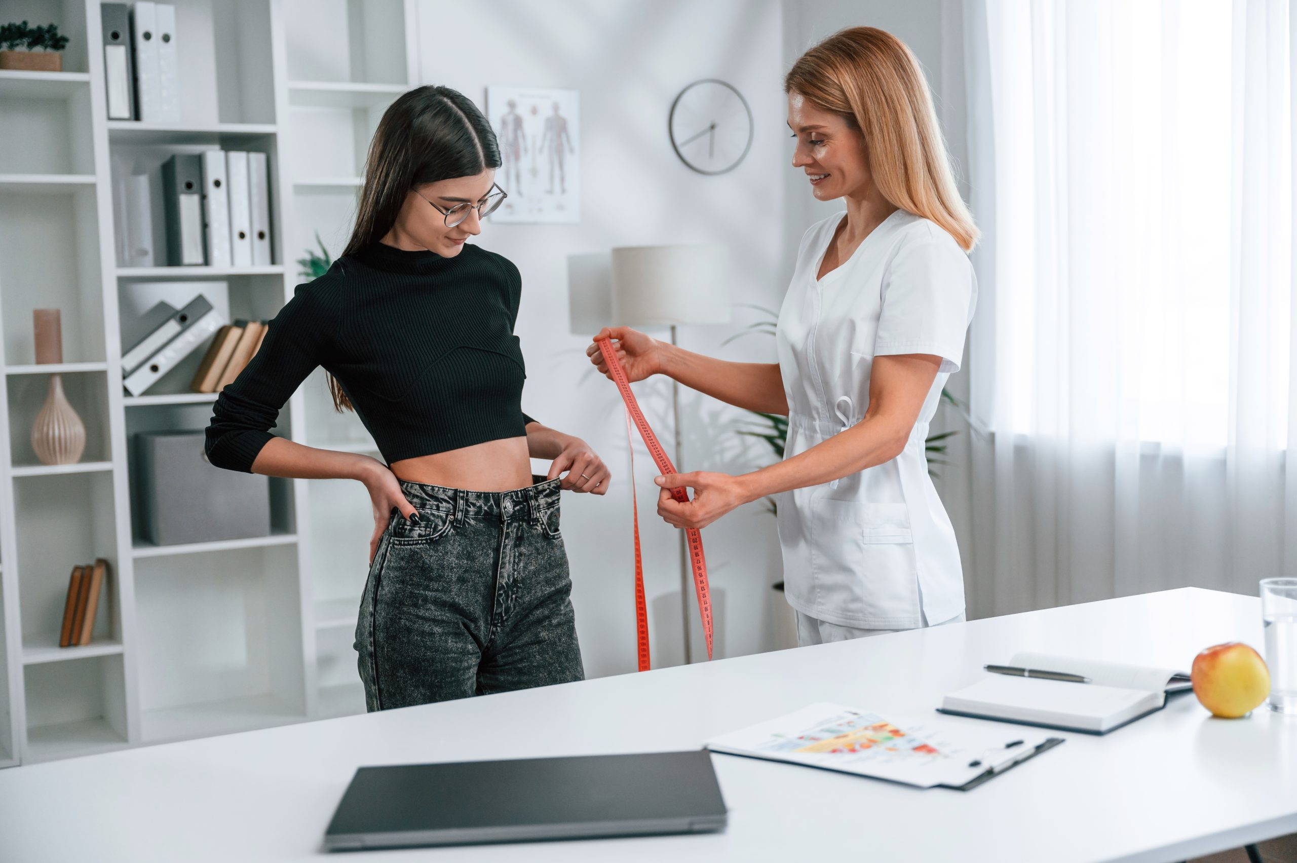 Dr. Baipalli Ramesh consulting a weight loss patient at Dr.ShapeX clinic in Visakhapatnam